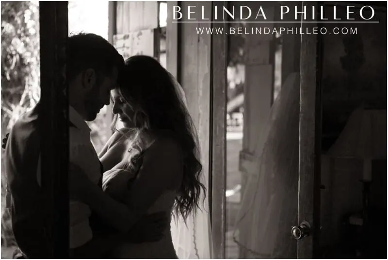 Bride and groom share a romantic moment on their wedding day at the Casa Cody Inn, Palm Springs, CA