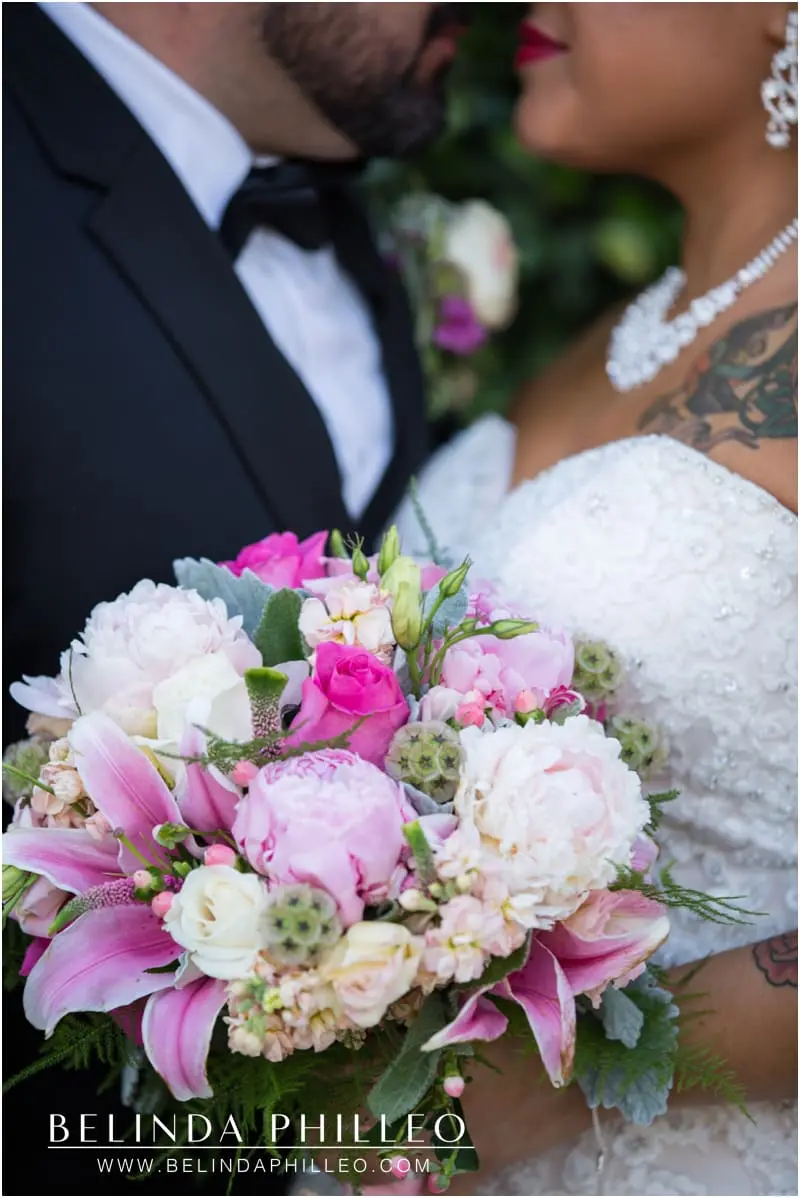 Bride and groom share a romantic moment before their reception in The Orange Circle, Orange, CA