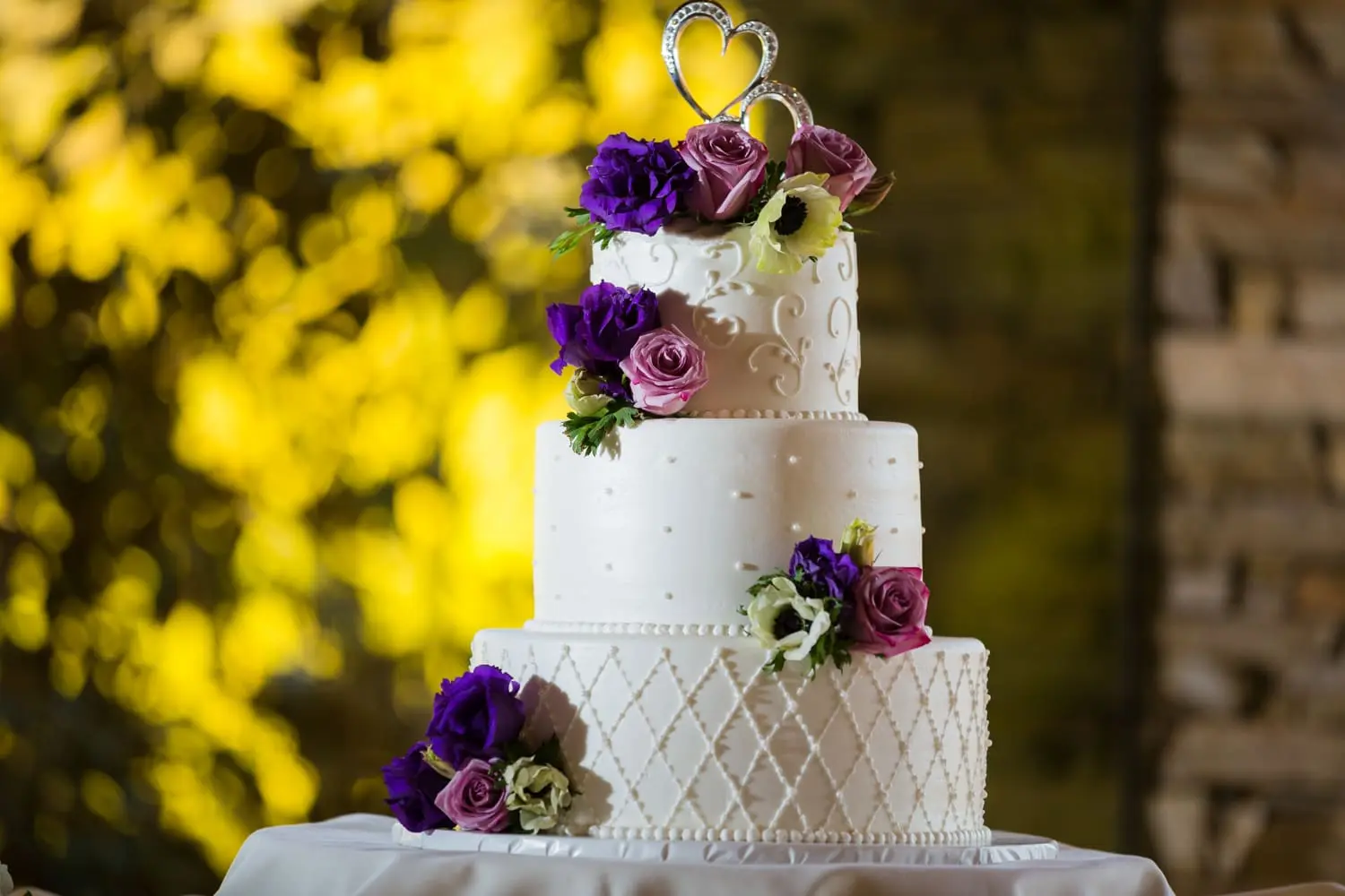 Purple and white wedding cake at Dove Canyon Golf Club, Dove Canyon, CA