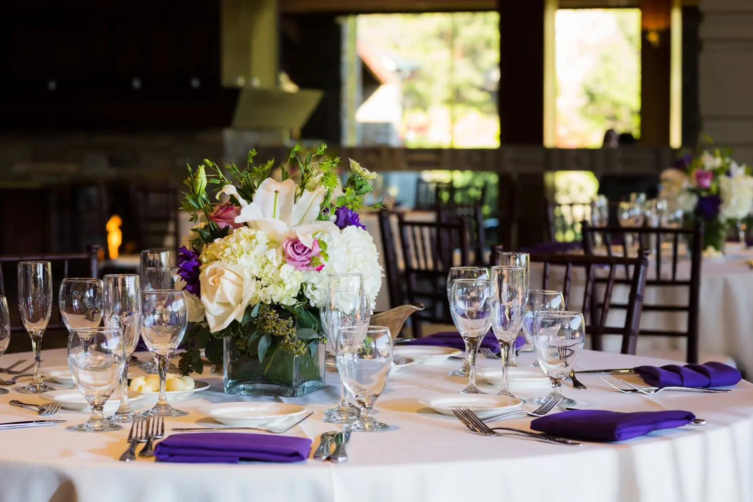 White and purple wedding reception decor at Dove Canyon Golf Club wedding in Orange County, CA