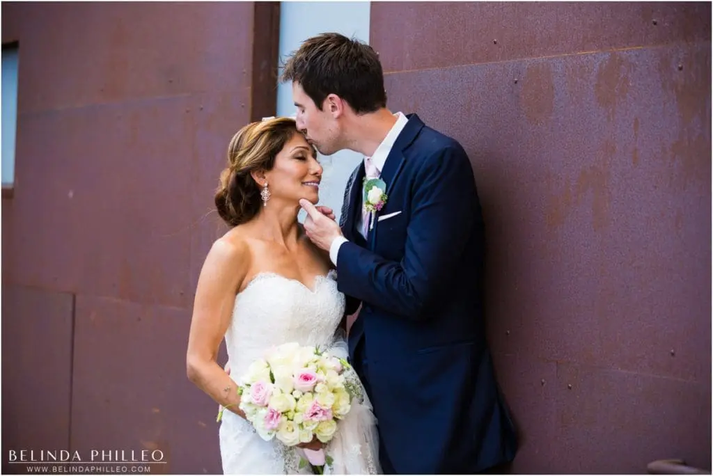 bride and groom share a quite moment Smog Shoppe Los Angeles Wedding. Photo by Belinda Philleo