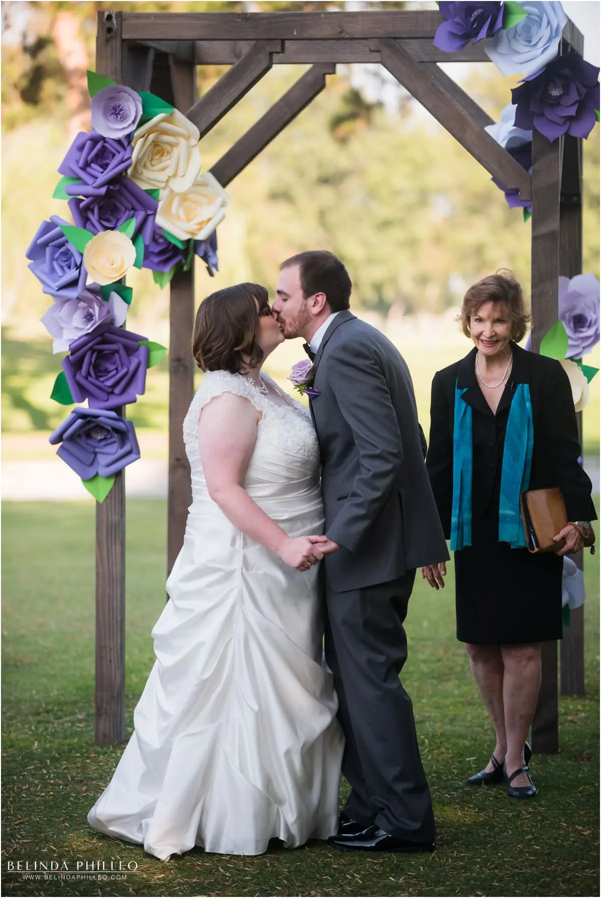 Bride and groom share first kiss at El Dorado Park Golf Club, Long Beach, CA 