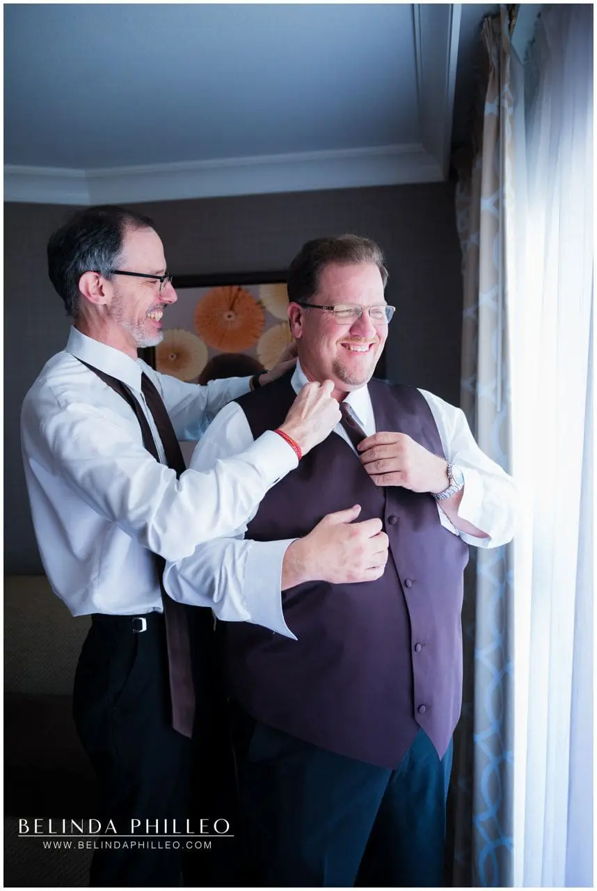 Groom gets ready at Hilton Waterfront Resort in Huntington Beach
