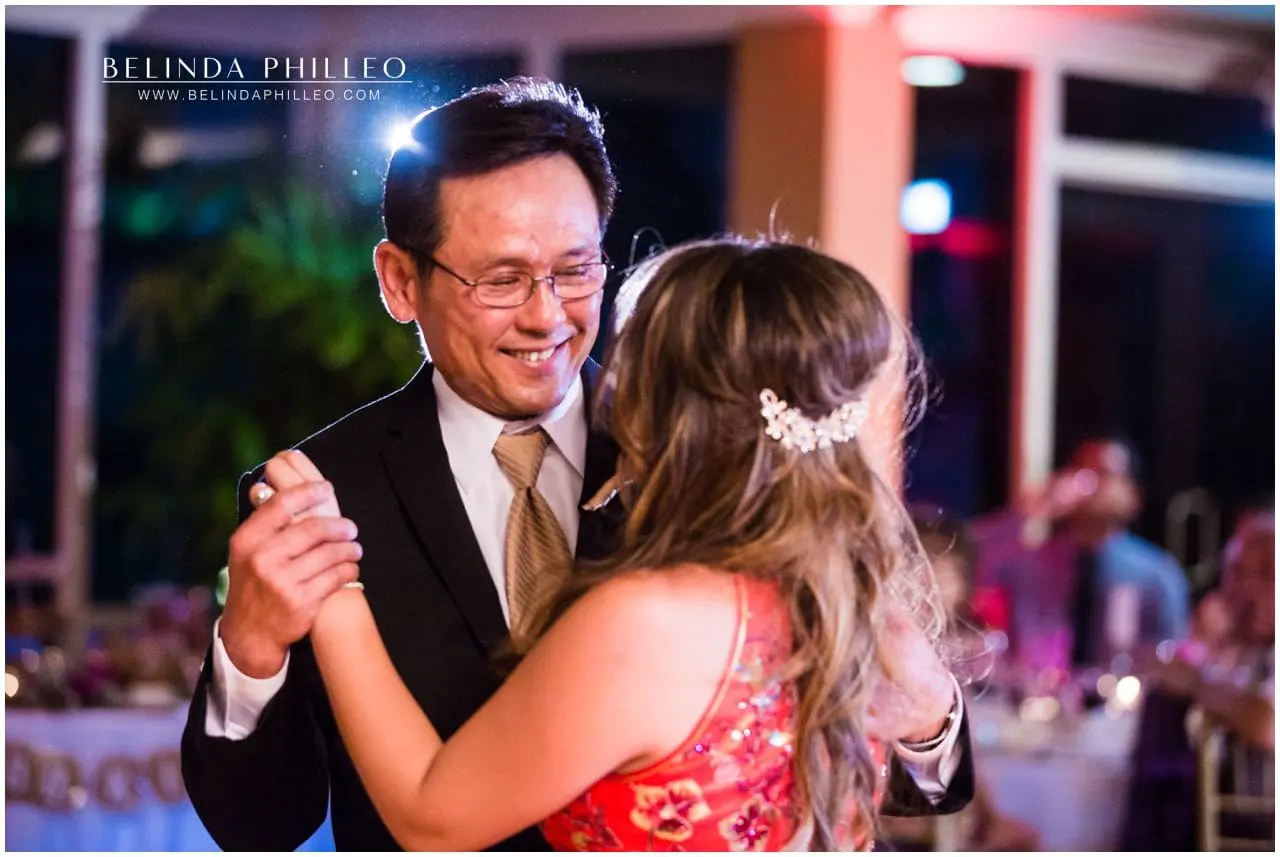 Bride dances with her father while wearing her Qipao at her Friendly Hills Country Club wedding