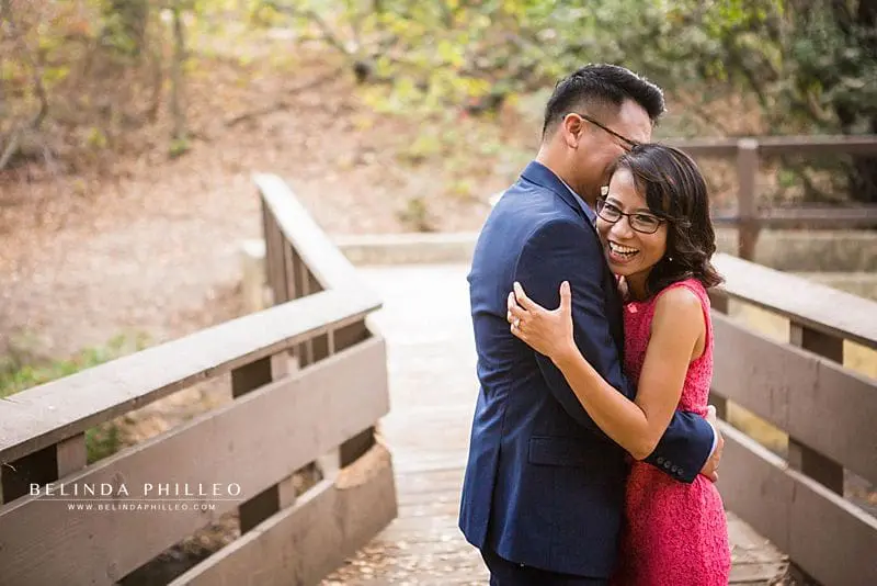 Couple having fun during their Oak Canyon Nature Center engagement photos by Belinda Philleo