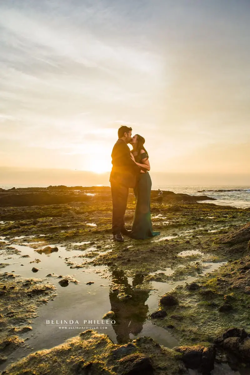 Romantic engagement photos at Laguna Beach during sunset