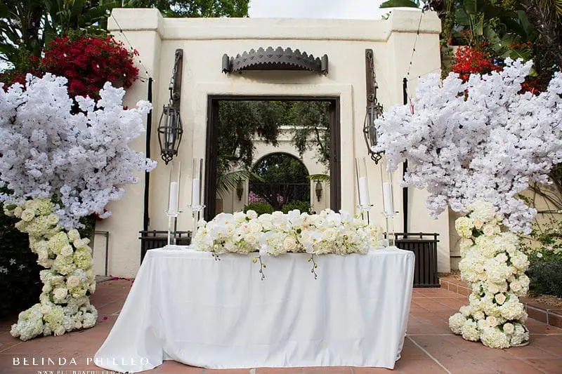 All white floral sweetheart table at Los Angeles River Center & Gardens wedding