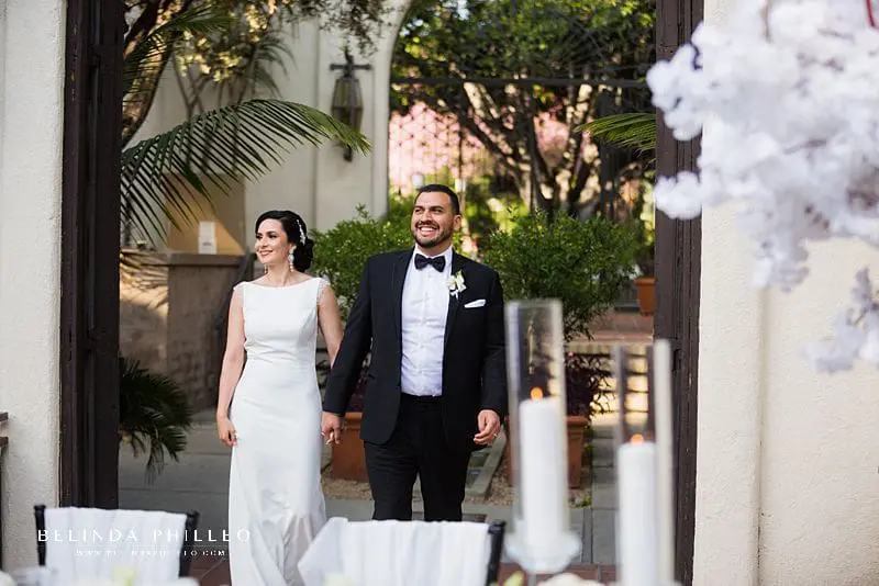 Bride and groom make their grand entrance at Los Angeles River Center & Gardens Wedding