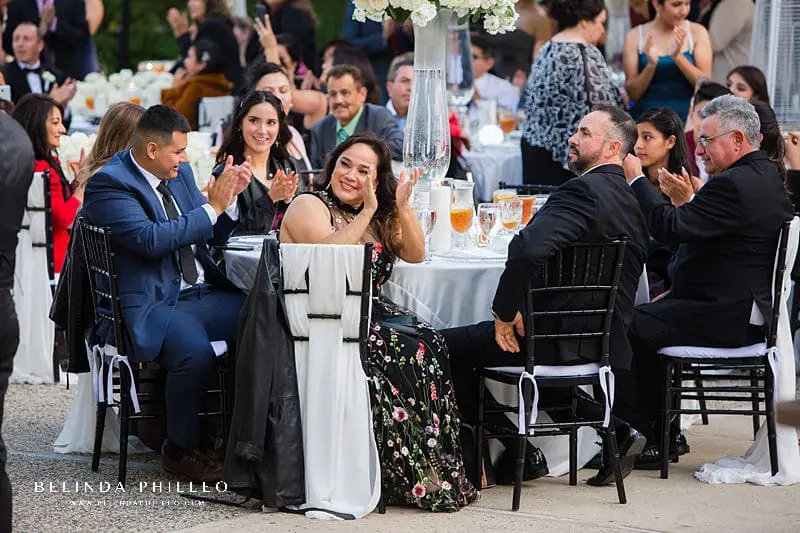 Guests clap for grand entrance at Los Angeles River Center & Gardens Wedding