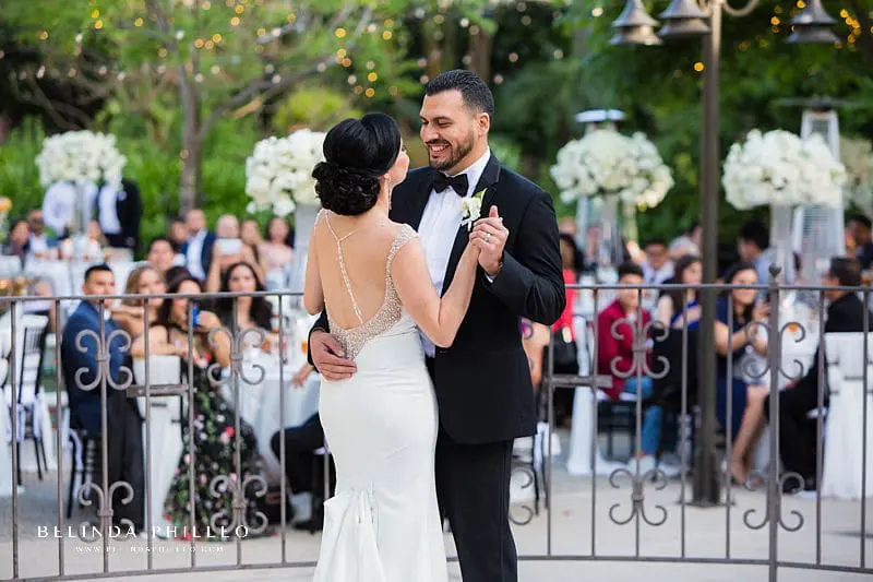 bride and groom share first dance at their Los Angeles River Center & Gardens wedding