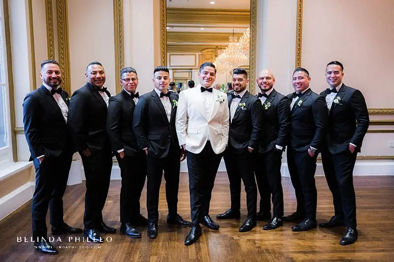Black and white tuxes for glamorous wedding at Alexandria Ballroom in Los Angeles, CA