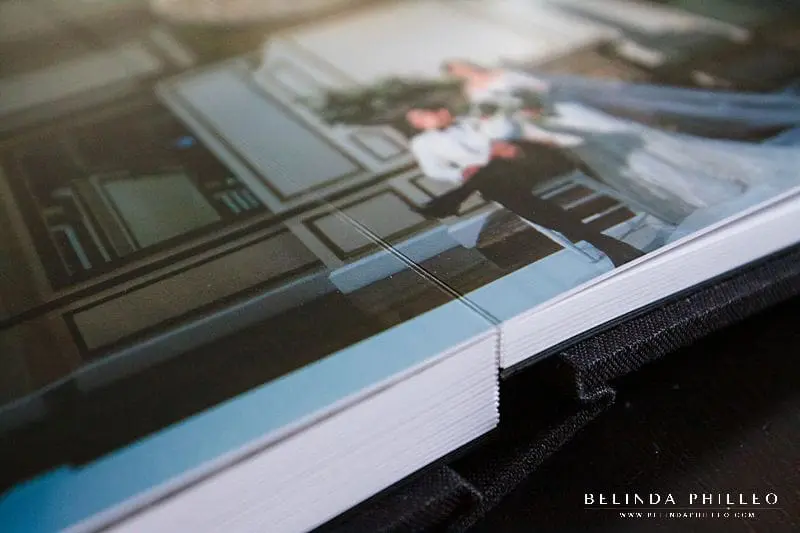 Professional wedding album with no cut center so images can be displayed across the entire book for maximum visual impact