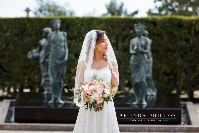 Bridal portrait in front of fountain at Cerritos Sculpture Garden