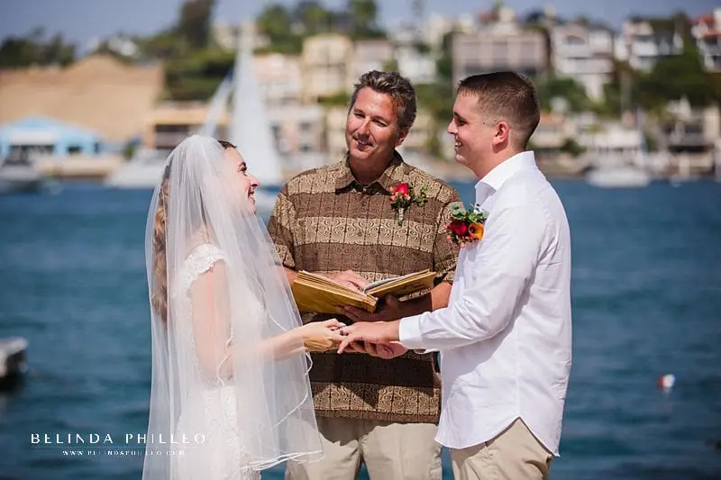 Couple exchanges wedding vows during their Newport Beach elopement