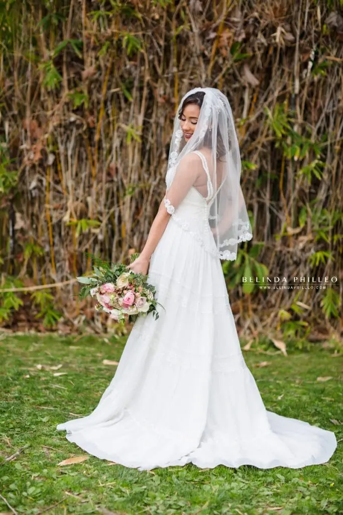Bride shows off her bohemian style Justin Alexander gown