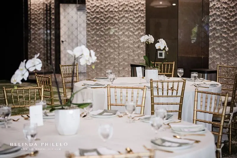 Gold and white table decor at JACCC wedding reception, Los Angeles, CA.