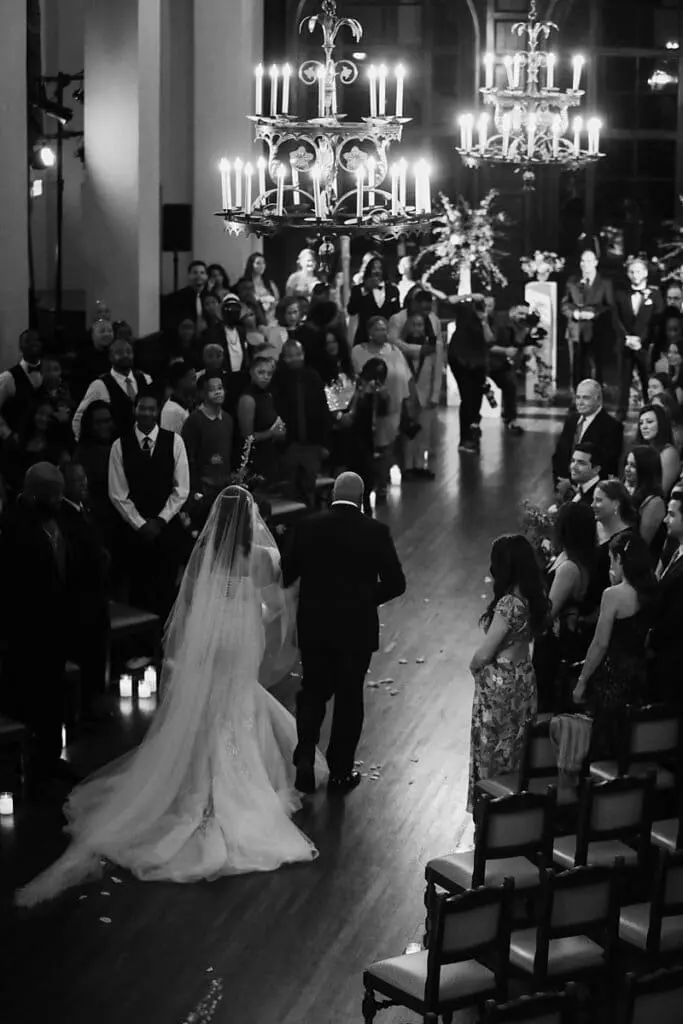 Bride walks down the aisle at Ebell of Los Angeles wedding ceremony