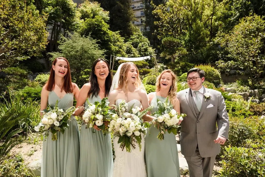 Bridal party laughing at Japanese American Cultural and Community Center wedding in Los Angeles, CA