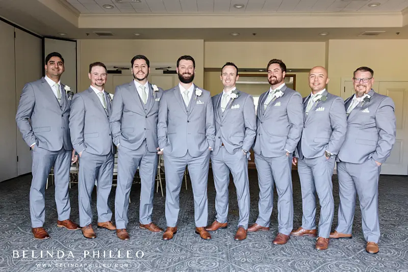 Groom and groomsmen get ready in Cypress Palm room at Los Coyotes Country Club