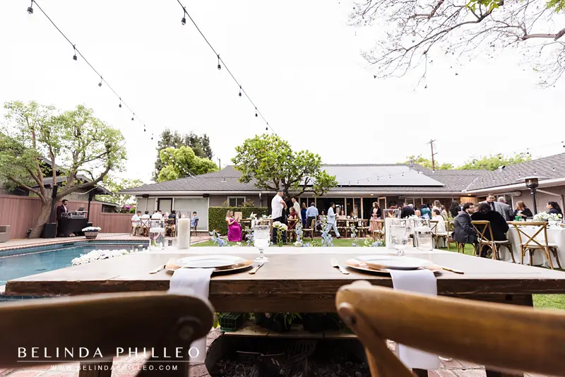 Wide angle view of a backyard wedding reception