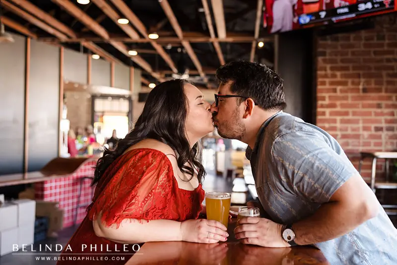 Couple shares a kiss over beers at Los Angeles brewery