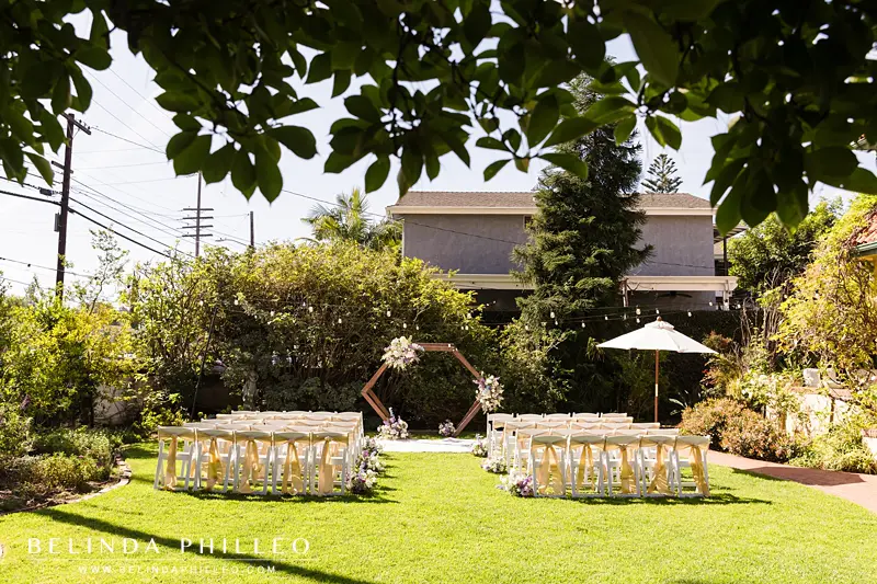 A wedding ceremony setup on the lawn of The French Estate in Orange, CA