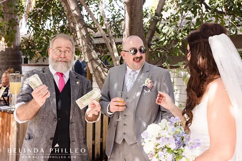 Richard the Magician wows newlyweds with slight-of-hand during cocktail hour