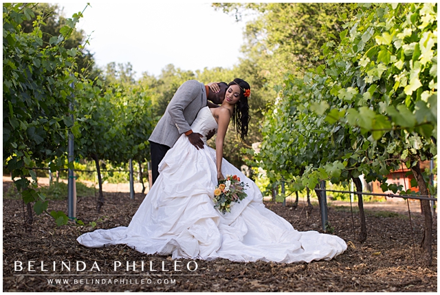 Bride and groom sharing a romantic moment in a temecula vinyeard