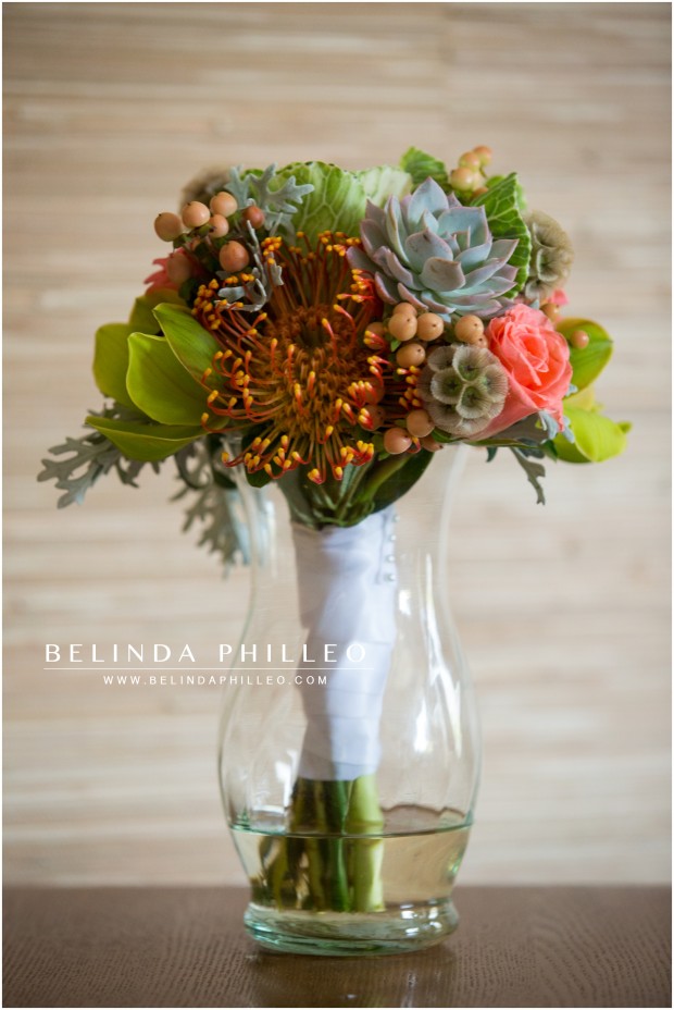 bridal bouquet of succulents, berries and roses