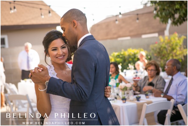 Bride and groom dance at their intimate backyard wedding reception, Buena Park, CA