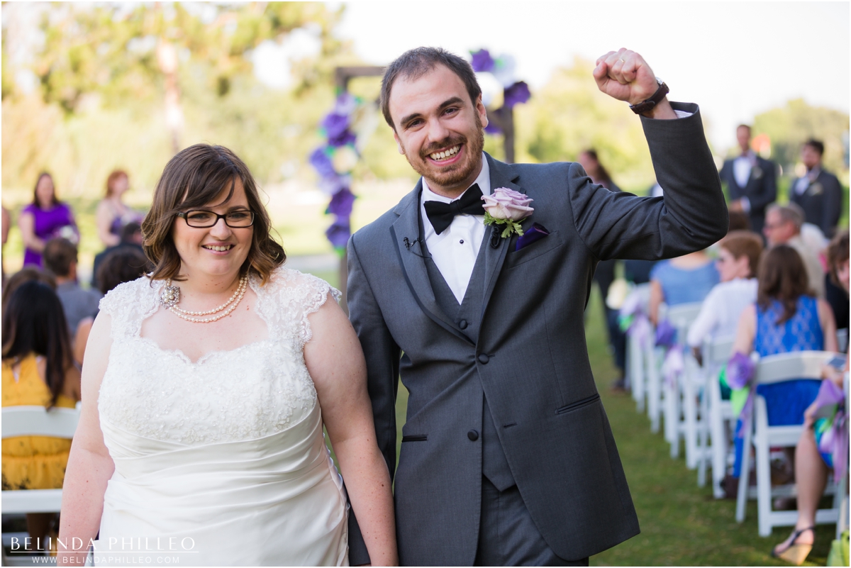 Bride and groom cheer after the ceremony at El Dorado Park Golf Club Wedding, Long Beach, CA