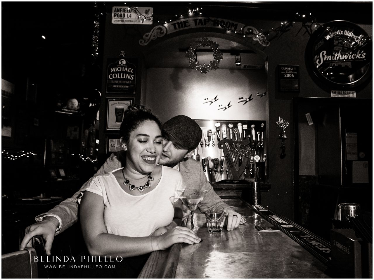 Couple shares a romantic moment in Branagan's Pub Downtown Fullerton. Photo by Belinda Philleo