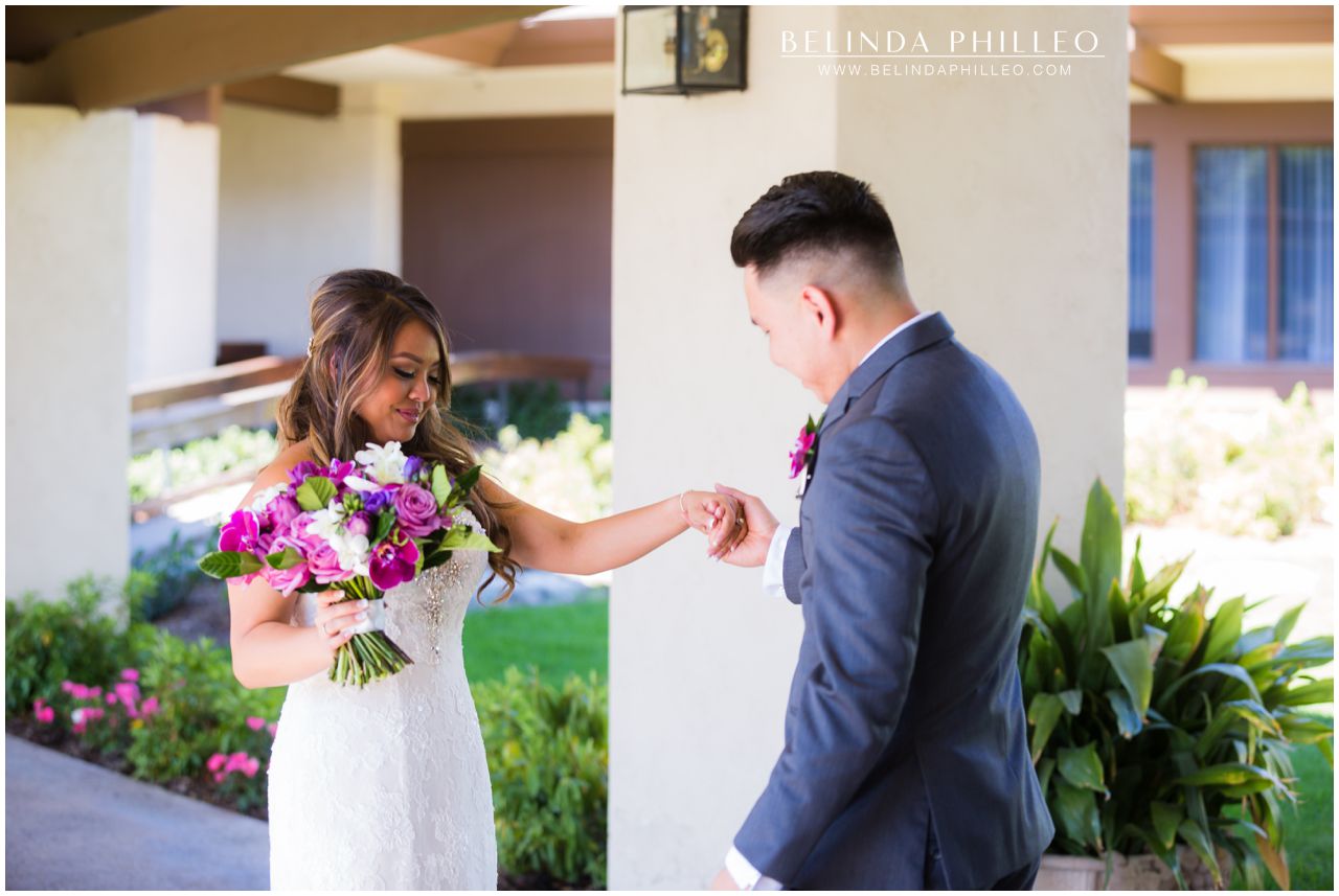 Bride and groom share intimate first look at Friendly Hills Country Club wedding in Whittier, CA