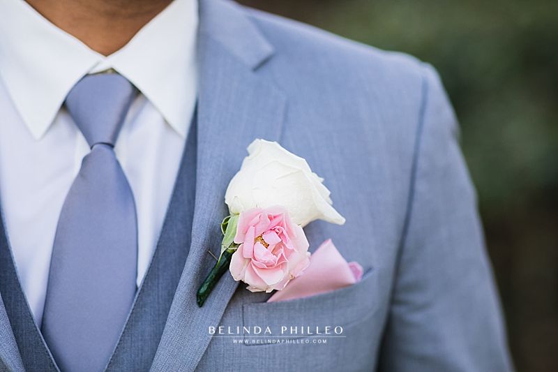 Pink and white groomsmen boutonnière 