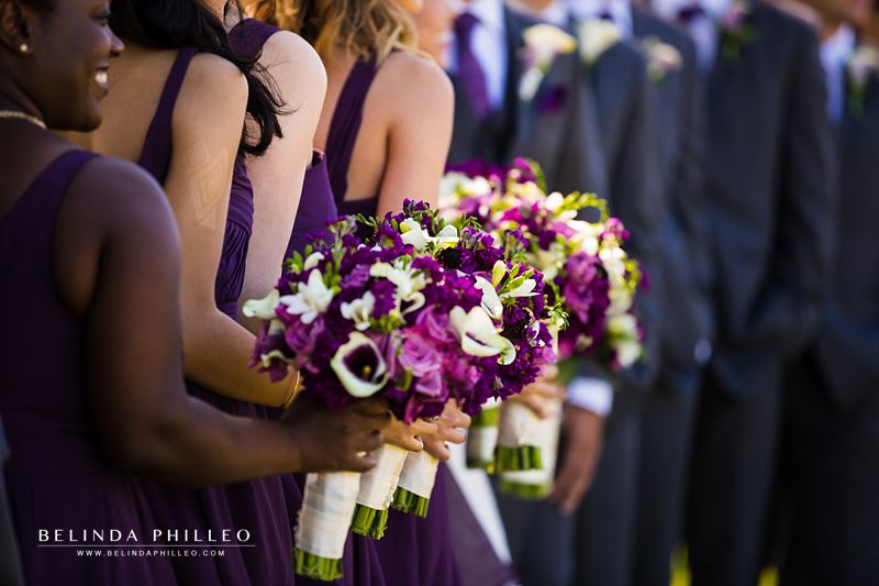 Purple and white bridesmaid bouquets at Laguna Cliffs Marriott wedding