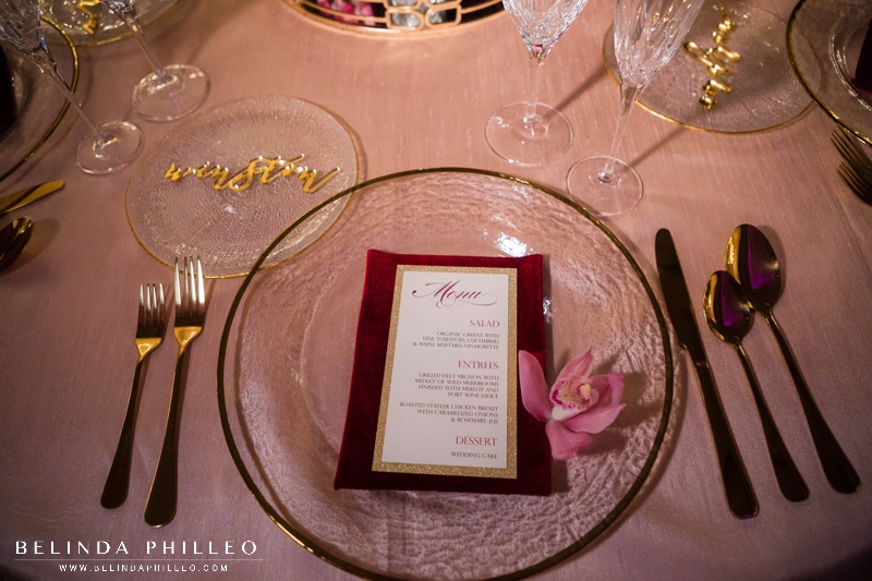 Blush, merlot and gold wedding reception decor