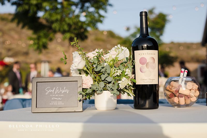 Wine bottle wedding guest sign in table