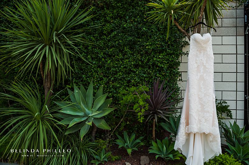 Bridal gown hangs outside Smogshoppe wedding in Los Angeles